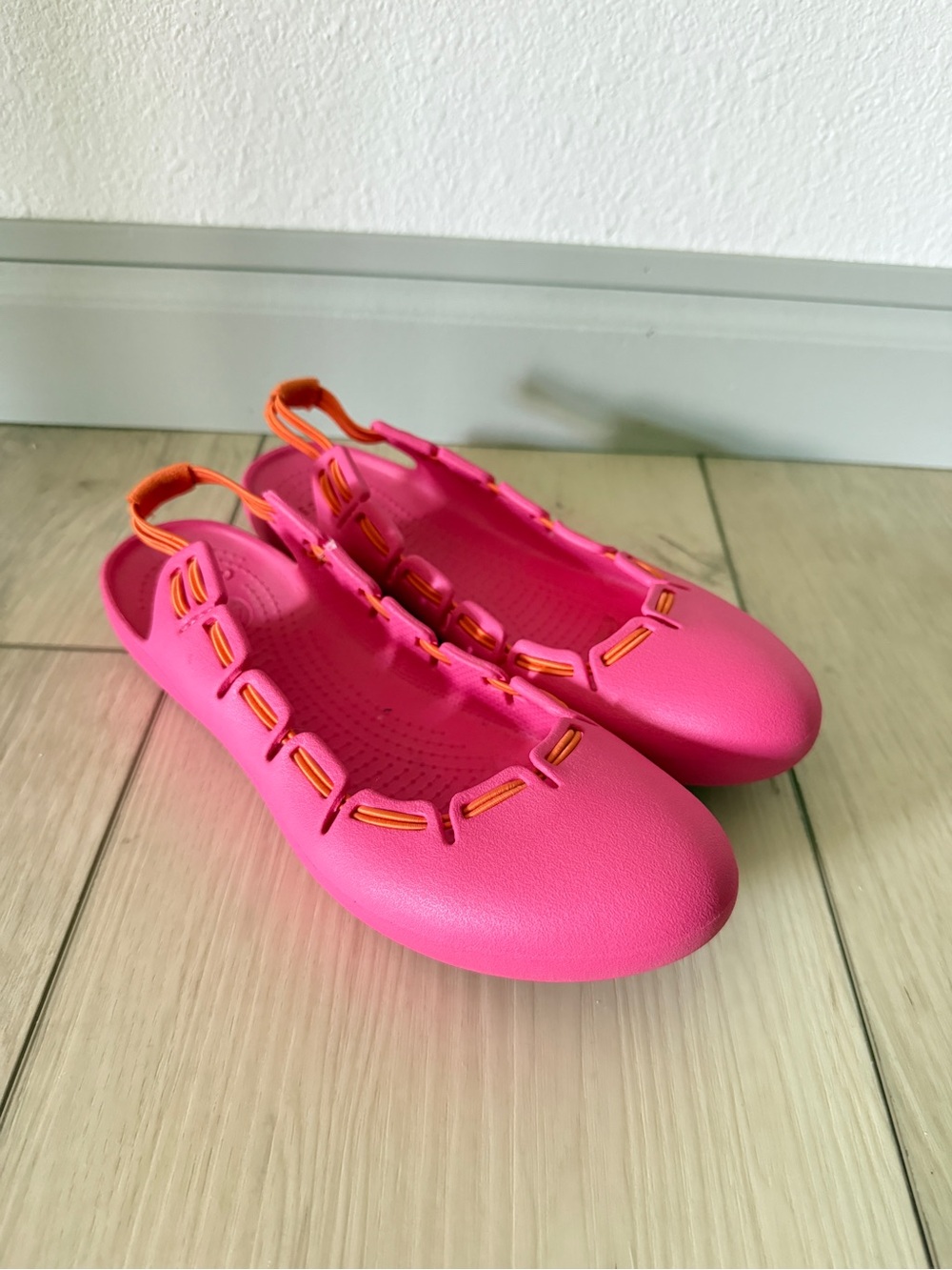 CROCS Women's Hot Pink Slip-On Flats with Orange Trim